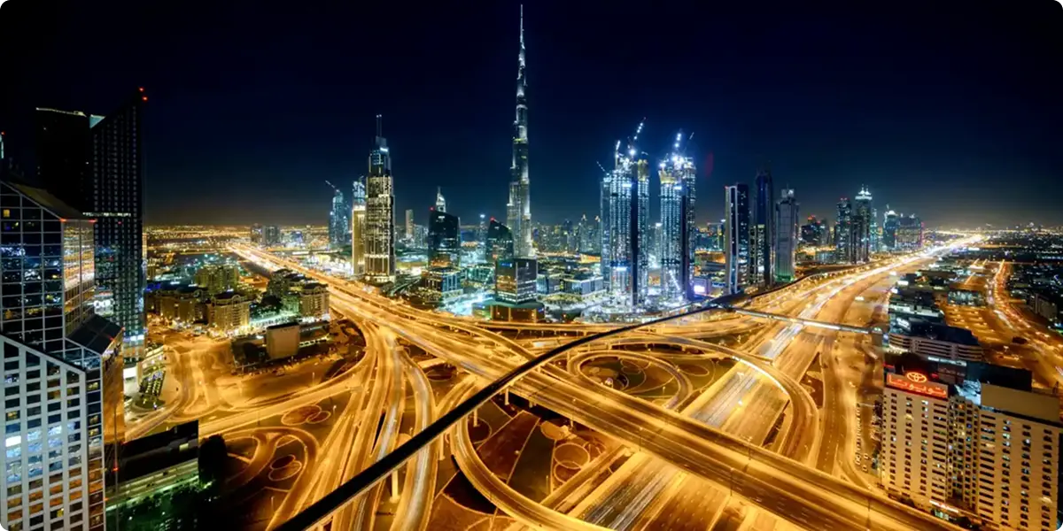 Image of a city at night from Zero&One